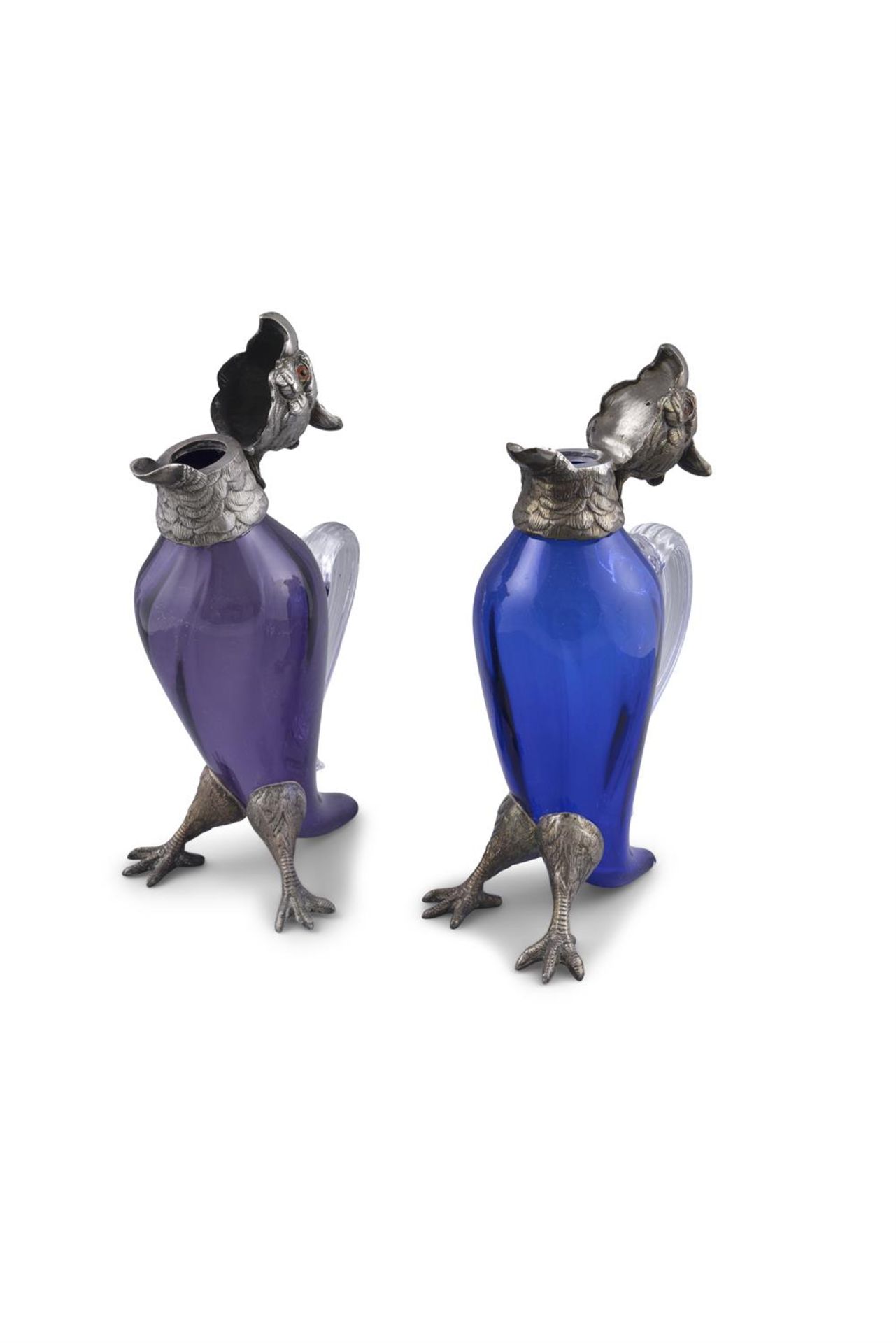 A PAIR OF CONTINENTAL PURLE AND BLUE GLASS DECANTERS IN THE FORM OF PARROTS, with silver - Image 2 of 3