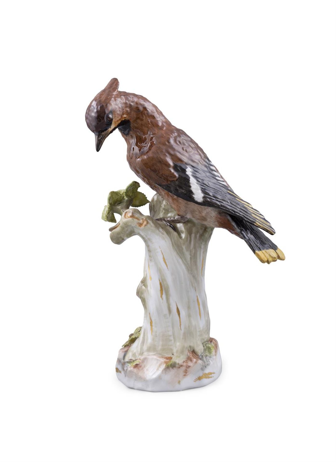 A 19TH CENTURY MEISSEN PAINTED PORCELAIN MODEL OF A RARE WAX WING, standing on a tree stump with fol