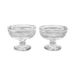 A PAIR OF MODERN WATERFORD CUT CRYSTAL PEDESTAL BOWLS with facetted rims and diamond cut