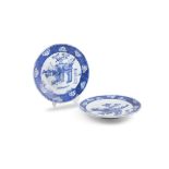 A NEAR PAIR OF CHINESE BLUE AND WHITE '100 ANTIQUES' PATTERN DISHES each of shallow circular