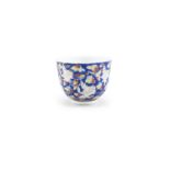 A CHINESE TONGZHI ENAMELLED WINE CUP the exterior enamelled with a continuous scene of cranes in