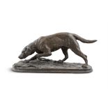 A FRENCH LATE 19TH CENTURY ANIMALIER BRONZE OF A HUNTING DOG on a naturalistic oval base