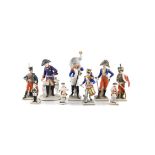A COLLECTION OF PORCELAIN MILITARY FIGURES comprising; three small Meissen figures 12cm high;
