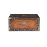 A VICTORIAN ROSEWOOD AND BRASS BOUND WRITING SLOPE of rectangular form with fitted interior.