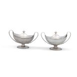A MATCHED PAIR OF GEORGE III SILVER SAUCE TUREENS AND COVERS IN NEO-CLASSICAL STYLE one London c.