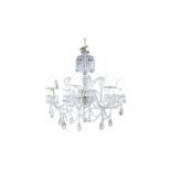 A LARGE CUT-GLASS EIGHT LIGHT CHANDELIER the domed corona hung with rows of cut glass beading,