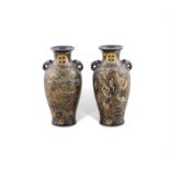 A PAIR OF SMALL JAPANESE SATSUMA JARS Meiji period, each gilded with groups of Buddhist