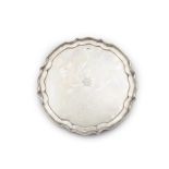A GEORGE V SILVER SALVER Sheffield 1916, of shaped circular form with pie crust rim,