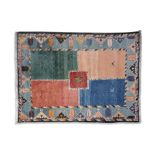 A PERSIAN GABBEH RUG the central square red medallion on a quadripartite ground,