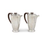 A PAIR OF GEORGE V SILVER COFFEE AND HOT WATER POTS Sheffield 1934, in the art deco taste,