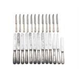 A SET OF TWELVE EDWARDIAN SILVER HANDLED TABLE KNIVES Sheffield c.1906; together with a set of