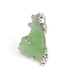 A JADE AND DIAMOND BROOCH, the carved plaque highlighted with brilliant-cut diamonds, length approx.