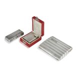 A SILVER CIGARETTE CASE AND TWO LIGHTERS, BY CARTIER, the cigarette polished case with fluted