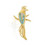 A TURQUOISE AND DIAMOND BROOCH, ITALIAN, CIRCA 1960, the stylised bird perched on a branch,