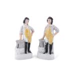 A PAIR OF LARGE STAFFORDSHIRE FIGURES OF FARRIERS, 43cm high