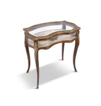A FRENCH 19TH CENTURY ORMOLU AND ROSEWOOD CURIO TABLE, the hinged glazed top with tongue and