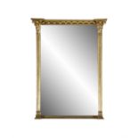 A REGENCY GILTWOOD PIER MIRROR of upright rectangular form, fitted with plain glass plate,