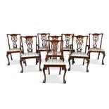 A SET OF EIGHT GEORGIAN REVIVAL 'CHIPPENDALE' MAHOGANY DINING CHAIRS, comprising two carvers