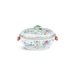 A CHINESE FAMILLE ROSE PORCELAIN SHAPED OVAL TUREEN AND LID, with pomegranate finial and twin