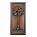 A FRAMED WOOD-CARVING RELIEF OF A TREE IN FULL LEAF portrayed in a domed niche. 55 x 23.5cm