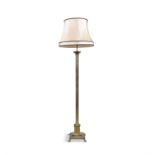 A BRASS STANDARD LAMP in the form of a Corinthian column, raised on out-stepped platform base