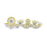 AN ENGLISH NINTEENTH CENTURY CHINA PART TEA SERVICE, the white ground decorated with exotic