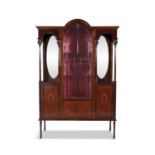 AN EDWARDIAN INLAID MAHOGANY DISPLAY CABINET the astragal central door flanked by open