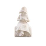 A CARVED ALABASTER FIGURE OF A YOUNG DUTCH GIRL, seated on a rock. 28cm high