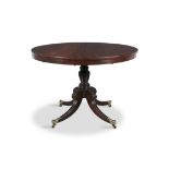 AN IRISH MAHOGANY CIRCULAR TILT-TOP TABLE, C.1830 stamped Williams & Gibton, 21547,