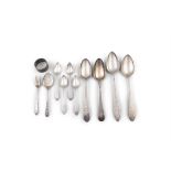 A MISCELLEANEOUS COLLECTION OF SILVER TABLEWARE comprising four large spoons, one fish slice,