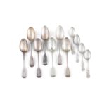 A SET OF SEVEN VICTORIAN FIDDLE PATTERN DESSERT SPOONS of various dates and makers; together