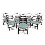 A SET OF 8 LADDER BACK MAHOGANY DINING CHAIRS, with two carvers and four singles,