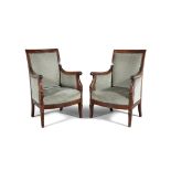 A PAIR OF CONTINENTAL MAHOGANY UPHOLSTERED ARMCHAIRS, MID 19TH CENTURY each with rectangular