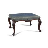 A VICTORIAN WALNUT FRAMED SQUARE STOOL upholstered in blue pattern fabric raised on curved