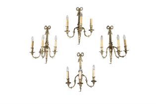 A SET OF FOUR 19TH CENTURY ORMOLU THREE-LIGHT WALL SCONCES the backplate in the form of a torch