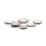 A COLLECTION OF SMALL IRISH SILVER BOWLS comprising one shaped bowl with pierced foliate