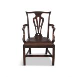 AN IRISH GEORGE III MAHOGANY OPEN ARMCHAIR, with pierced vase shaped splat, the out-turned arms