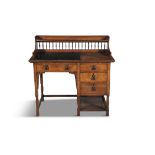 AN ARTS & CRAFTS STAINED OAK DESK ATTRIBUTED TO SHAPLAND & PETTER OF BARNSTABLE, with raised