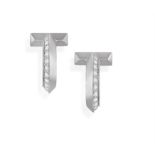 A PAIR OF DIAMOND 'TIFFANY T' HOOP EARRINGS, BY TIFFANY AND CO. Each polished hoop highlighted