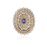 A LATE 19TH CENTURY SAPPHIRE AND SEED PEARL BROOCH Of flowerhead design, centring a
