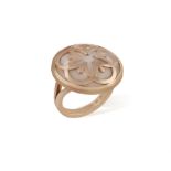 A MOTHER-OF-PEARL AND GOLD 'FLOWER' RING, BY OMEGA Of slightly bombé design, the circular