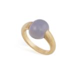 A CHALCEDONY 'M'AMA NON M'AMA' RING, BY POMELLATO Set with an oval-shaped lavender chalcedony