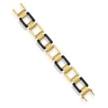 A RETRO GOLD BRACELET, CIRCA 1960 Composed of openwork square panels in gold or black (possibly