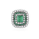 A LATE 19TH CENTURY EMERALD AND DIAMOND BROOCH, CIRCA 1890 The central collet-set square-cut