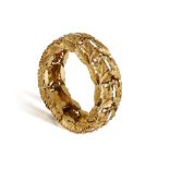 A RARE DIAMOND AND GOLD BRACELET, FRENCH, CIRCA 1950 The articulated bracelet set with textured