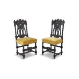 TWO BLACK STAINED OAK OCCASIONAL CHAIRS, 19TH CENTURY IN 'JACOBEAN' STYLE the open backs with