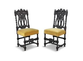 TWO BLACK STAINED OAK OCCASIONAL CHAIRS, 19TH CENTURY IN 'JACOBEAN' STYLE the open backs with