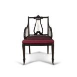 A LATE VICTORIAN MAHOGANY FRAMED ELBOW CHAIR, of George III Style, with brass-mounted lyre splat