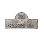 A CAST METAL PAINTED 'COUNTY OF LONDONDERRY' SIGN, the domed top containing the County of