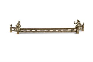 A 19TH CENTURY FRENCH BRASS BREAKFRONT FENDER, the pierced gallery with beaded banding, decorated